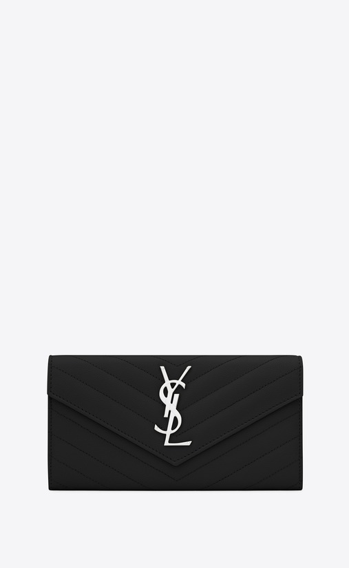Monogram large flap wallet in grain de poudre embossed leather